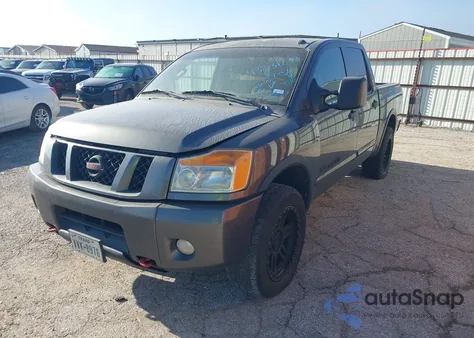 2012 Nissan Titan Pro-4X z USA, uszkodzony, nr VIN 1N6BA0EC7CN303323